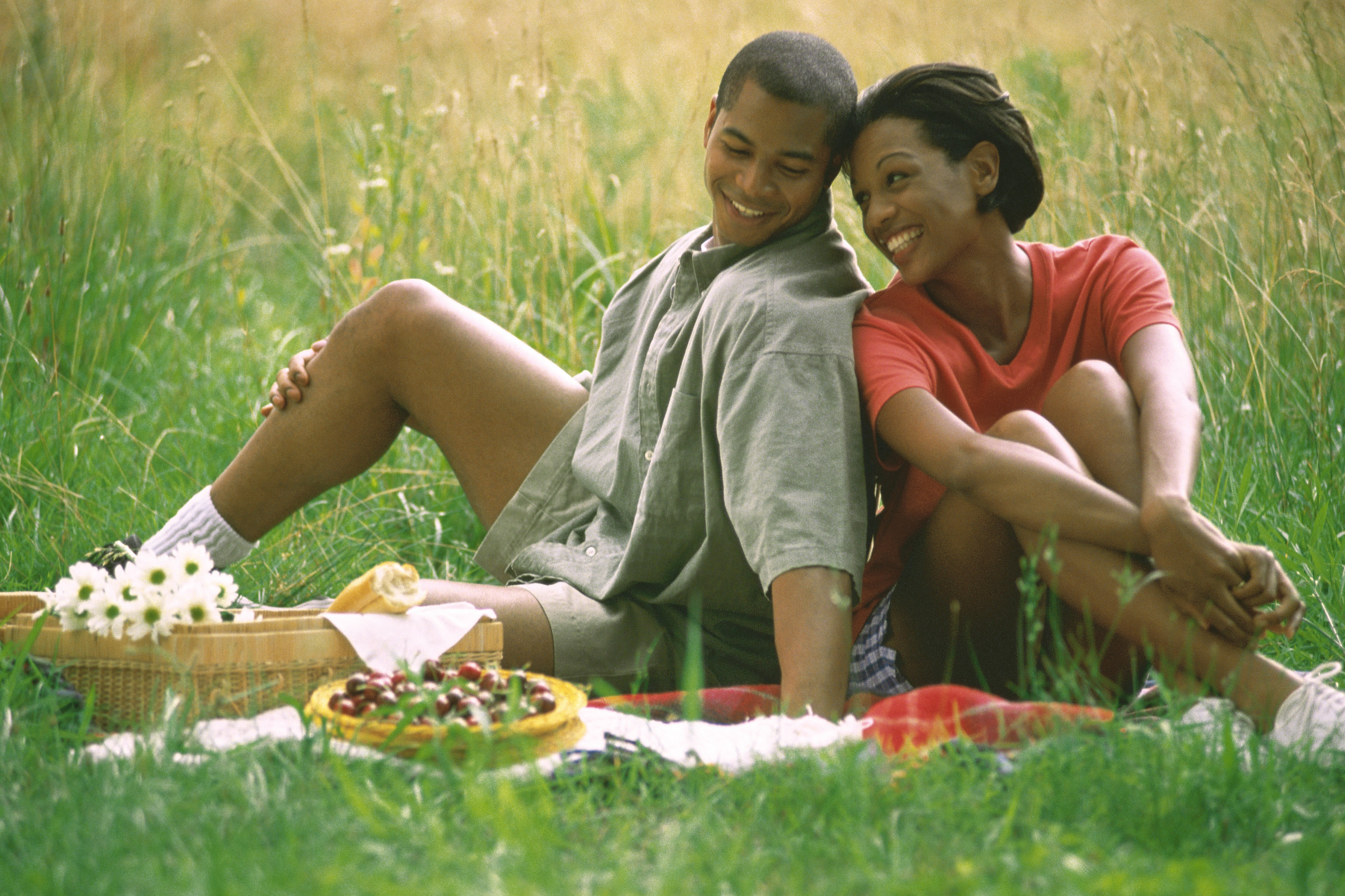 Happy Couple enjoying an outdoor picnick.
