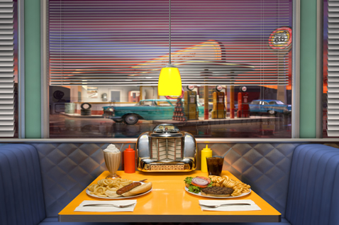 Diner booth with great menu covers in use.