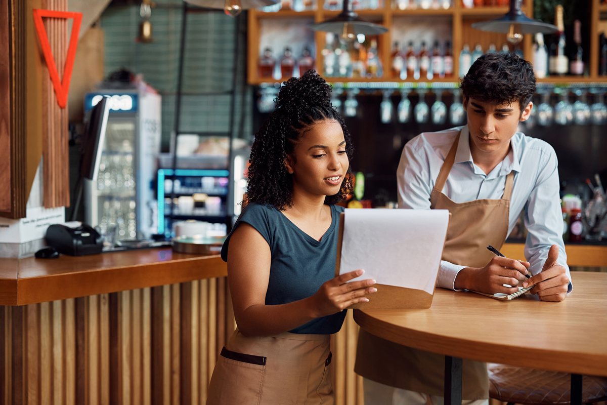 ORDERING restaurant supplies comes naturally to these hard working employees.