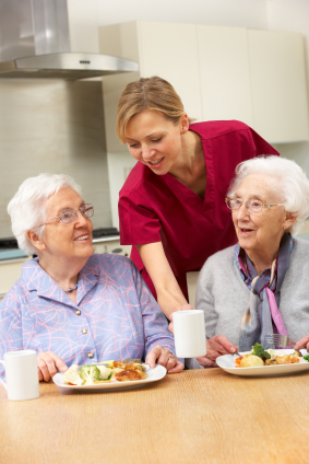Assisted living dining room utilizing anti-bacterial menu covers.