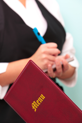 Waitress with guest check pad.