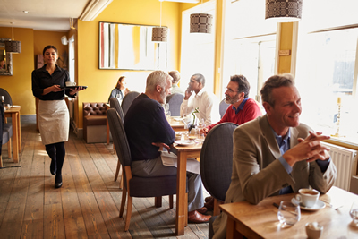 Wood look restaurant dining room.